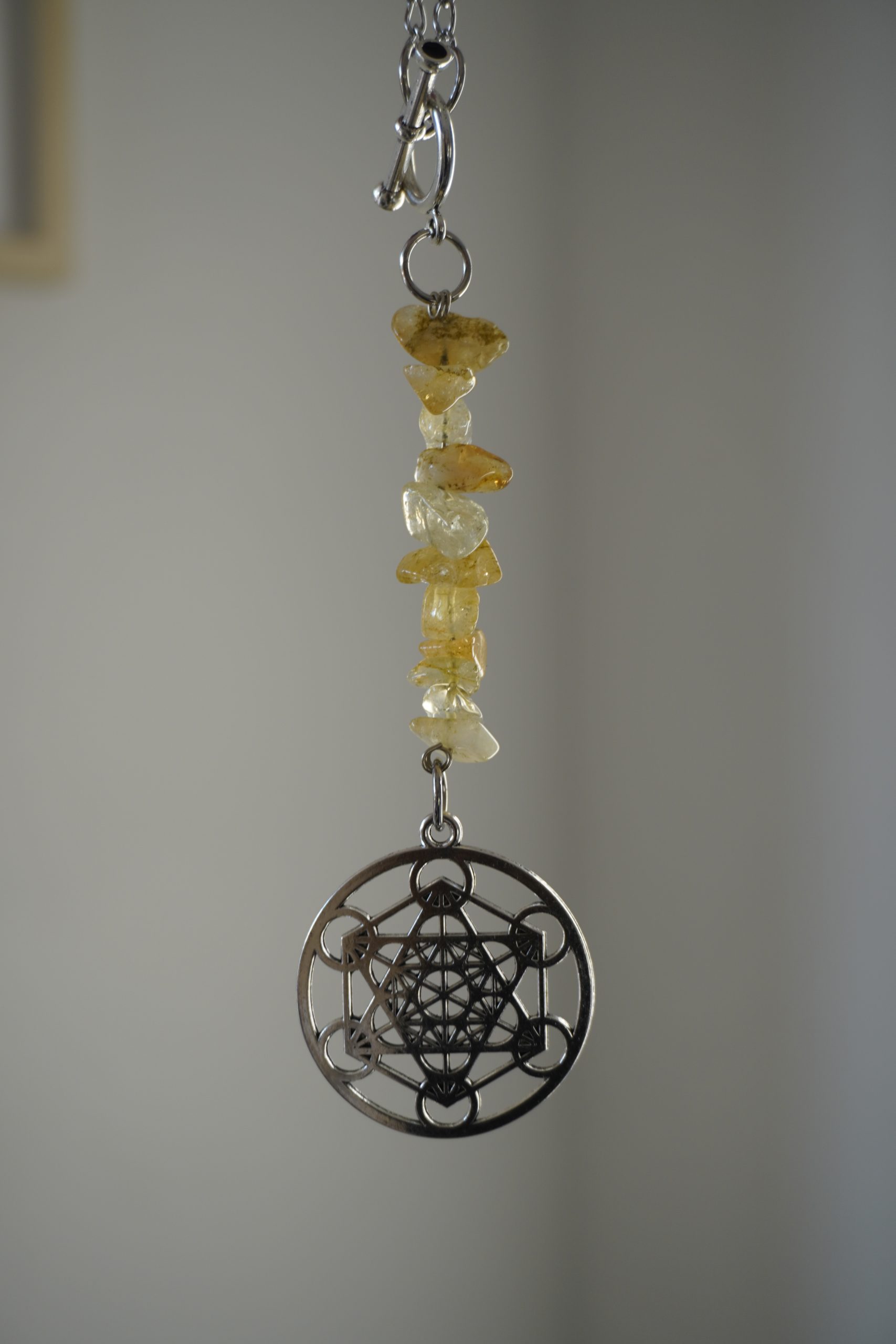 Amuleto auto citrino Cubo Metaton